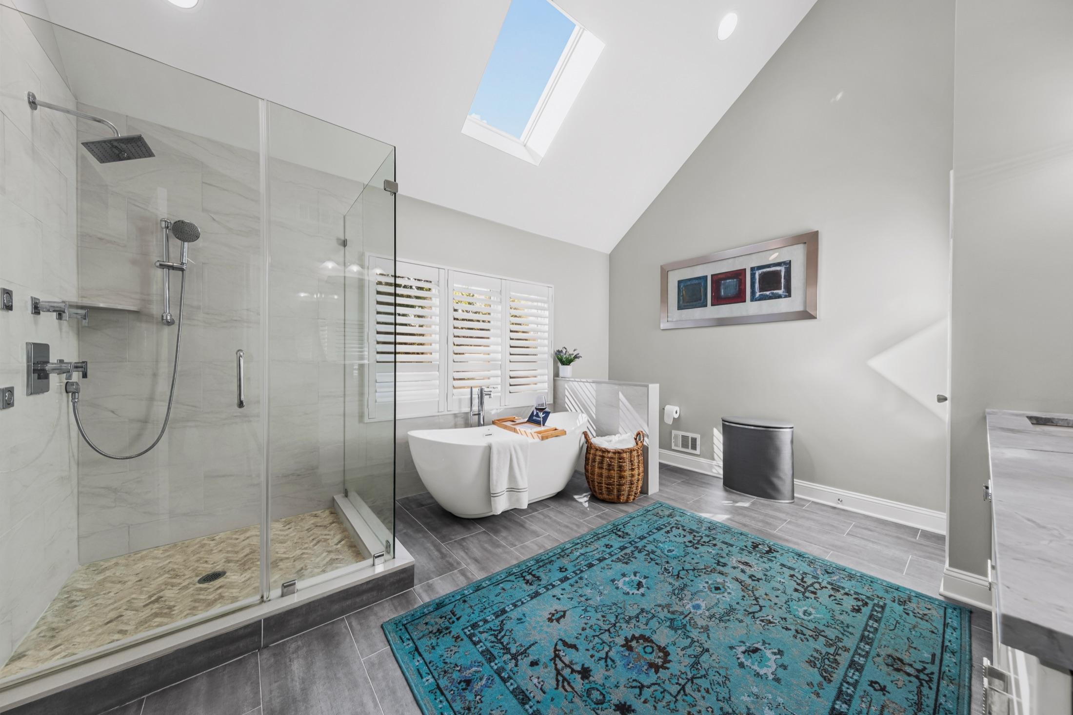 Renovated primary bathroom with skylight, glass shower & freestanding tub, Tinton Falls NJ