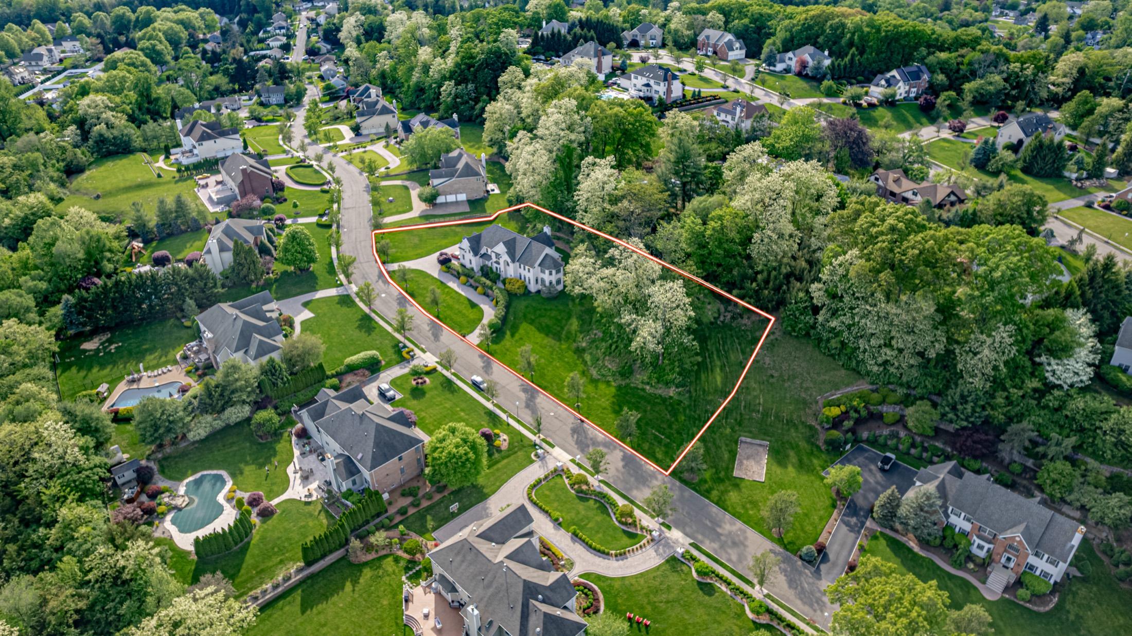 Aerial drone photo with property lot lines marked