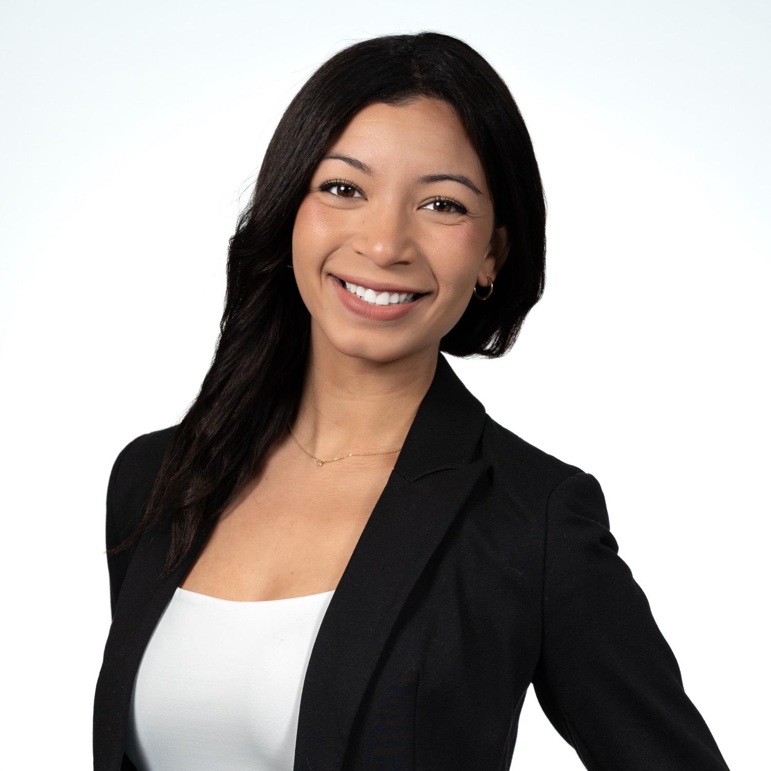 Professional corporate headshot of a woman