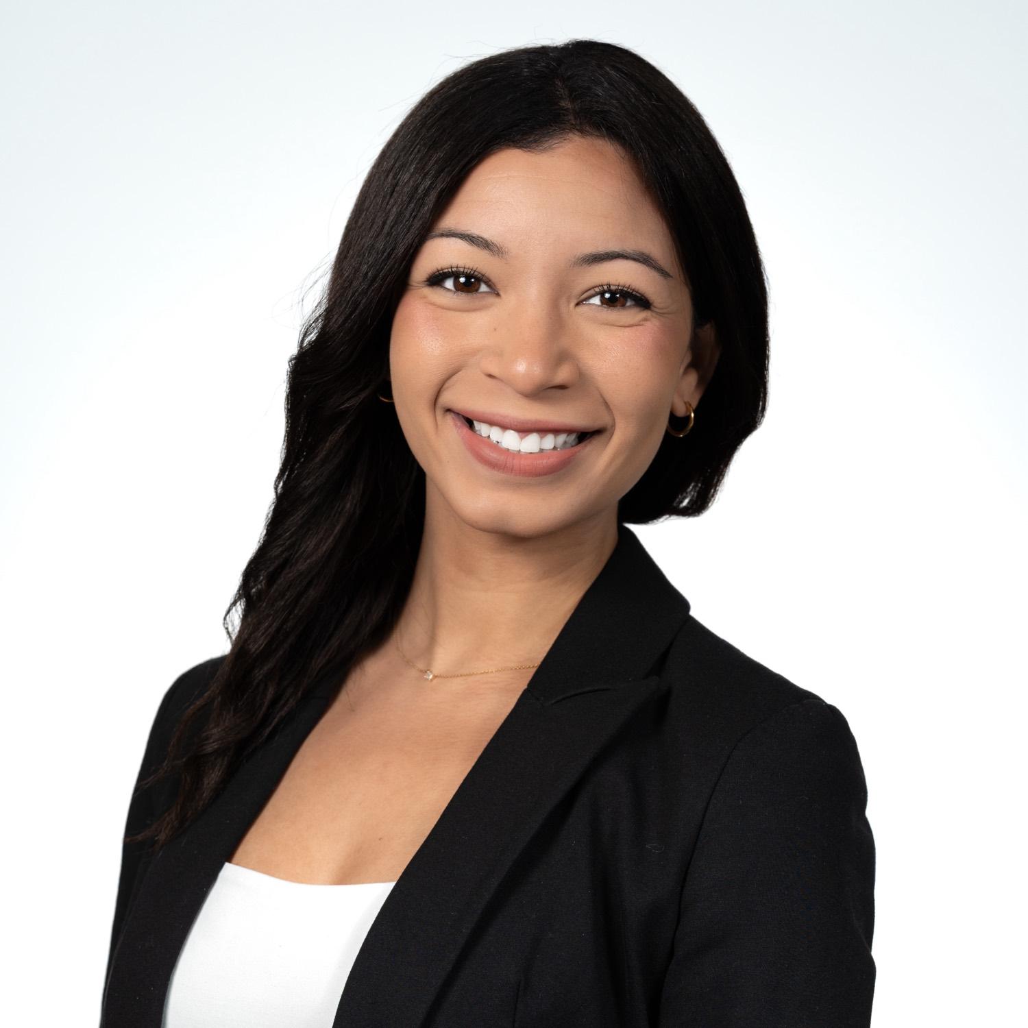 Professional corporate headshot of a woman