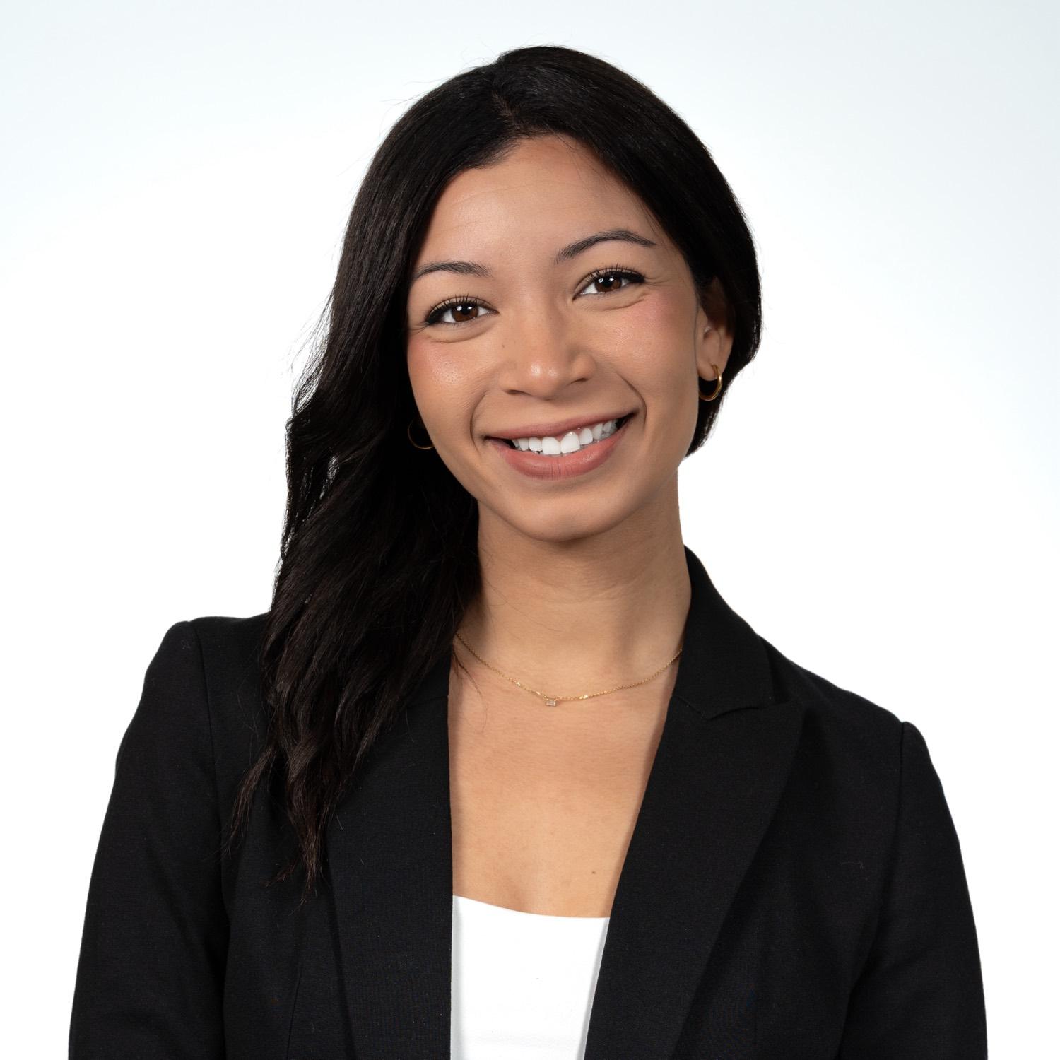 Professional corporate headshot of a woman