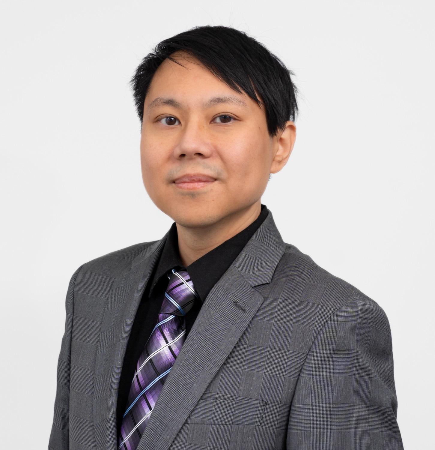 Professional headshot of a man