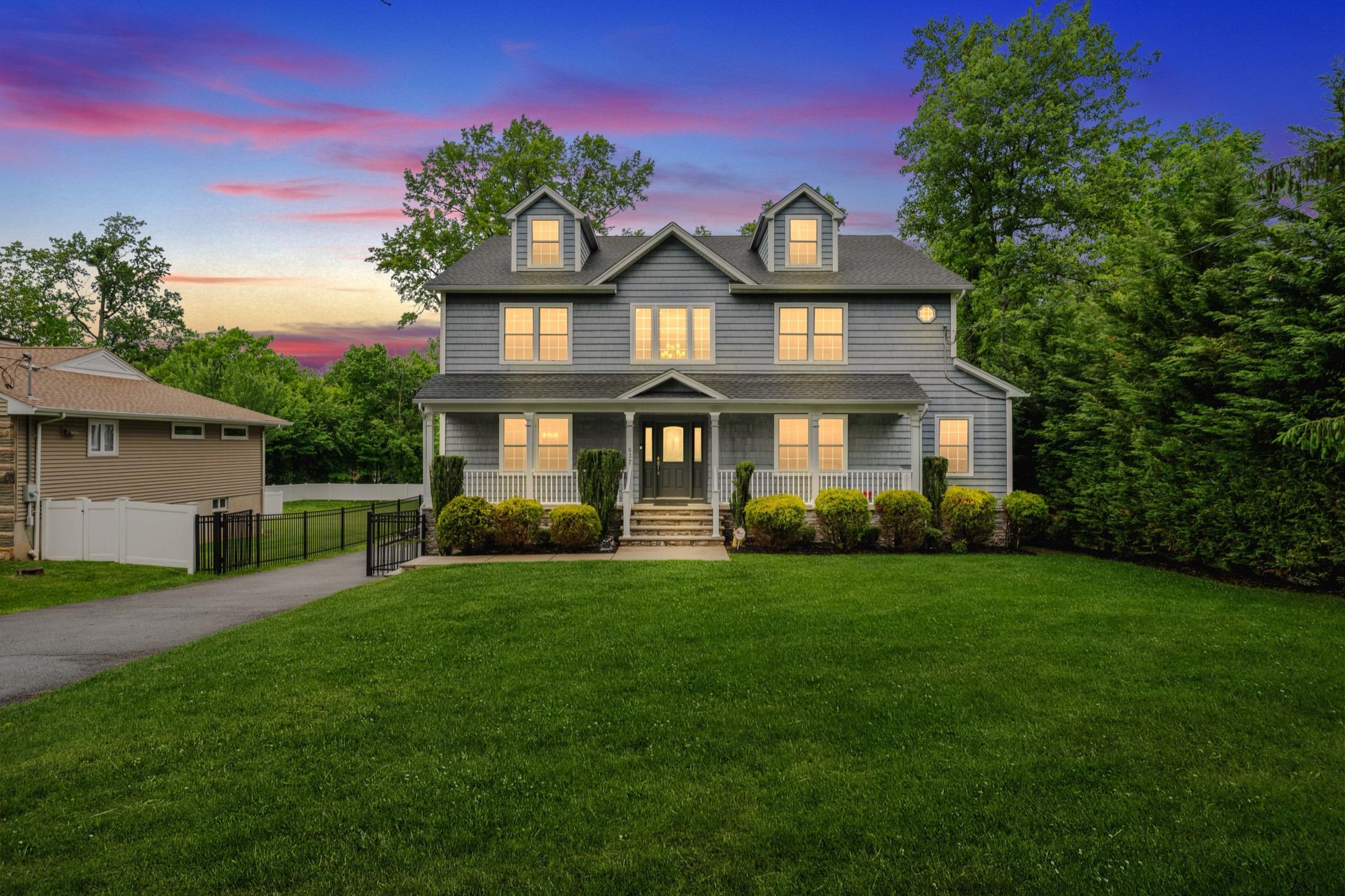 Colonial home at dusk with a violet twilight sky, Berkeley Heights NJ