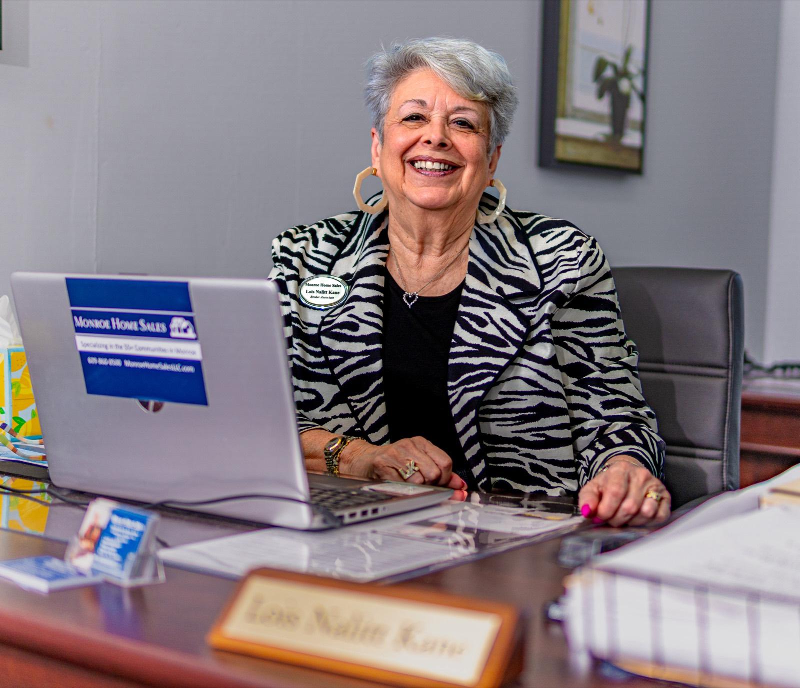 Environmental office portrait of a real estate professional