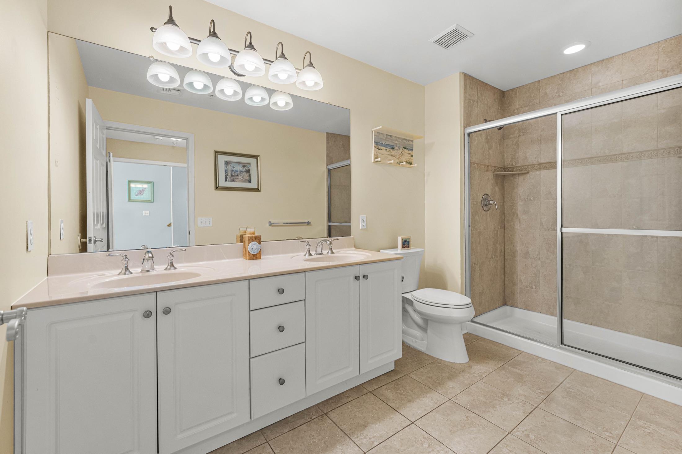 Full bathroom with a double vanity and glass shower, Seaside Heights rental