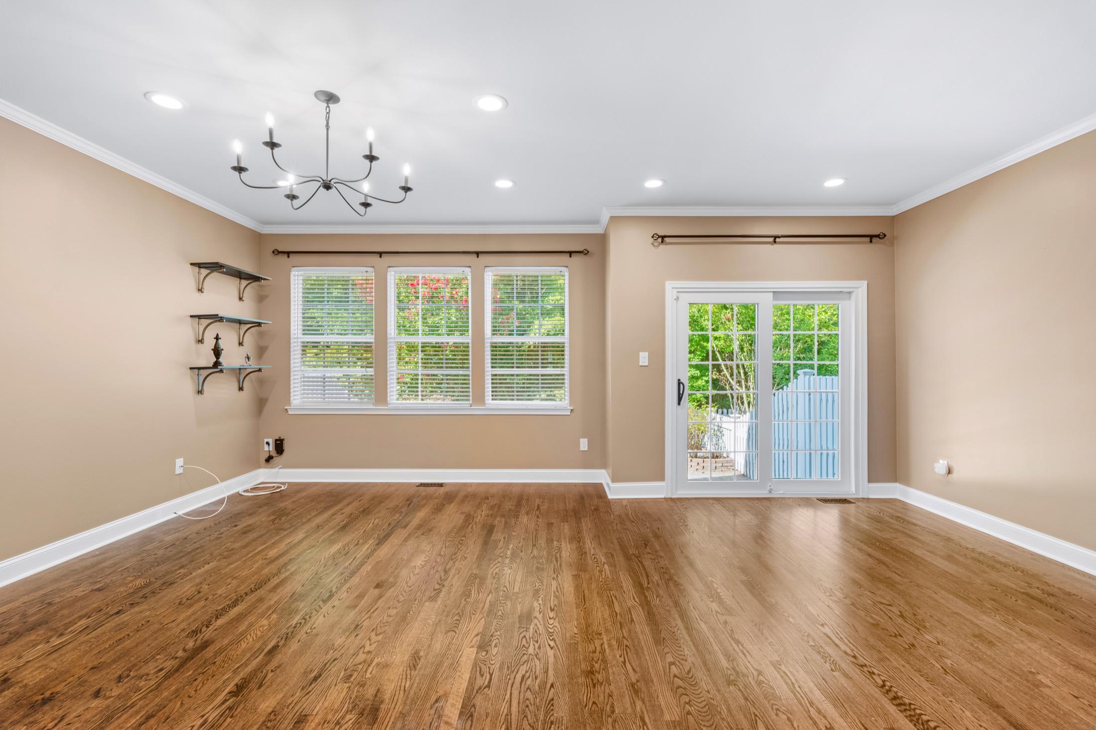 Empty living and dining room, before virtual staging