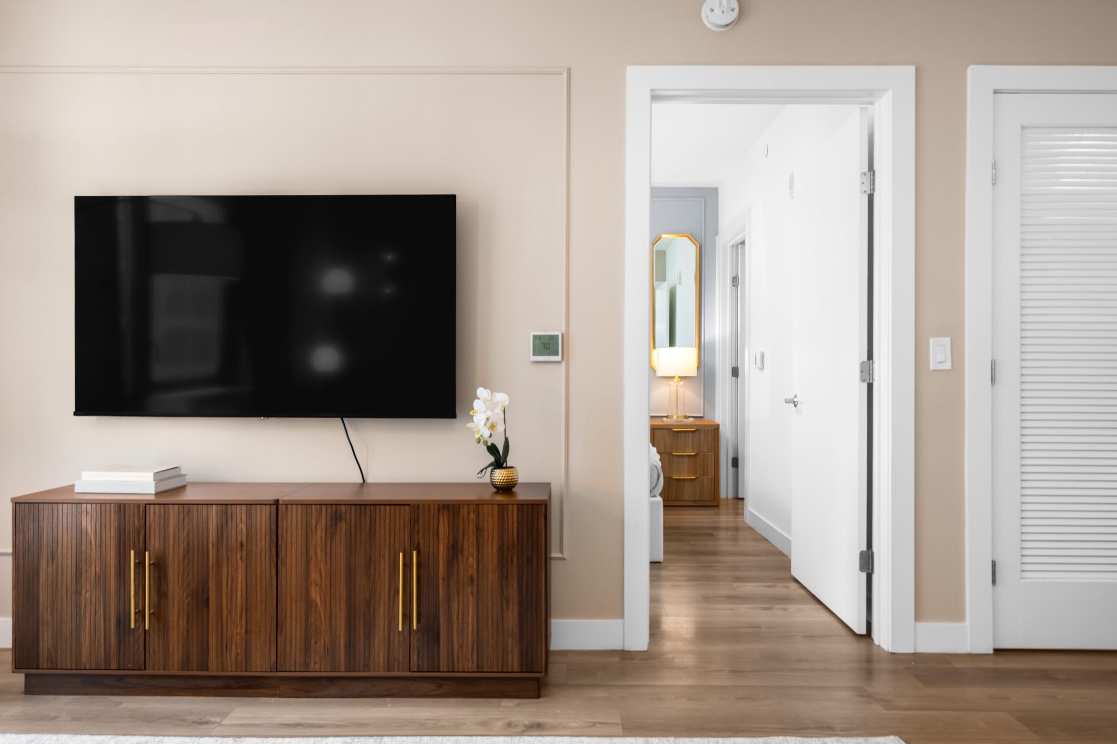 Walnut media console detail with a view down the hall, Hamilton Cove NJ