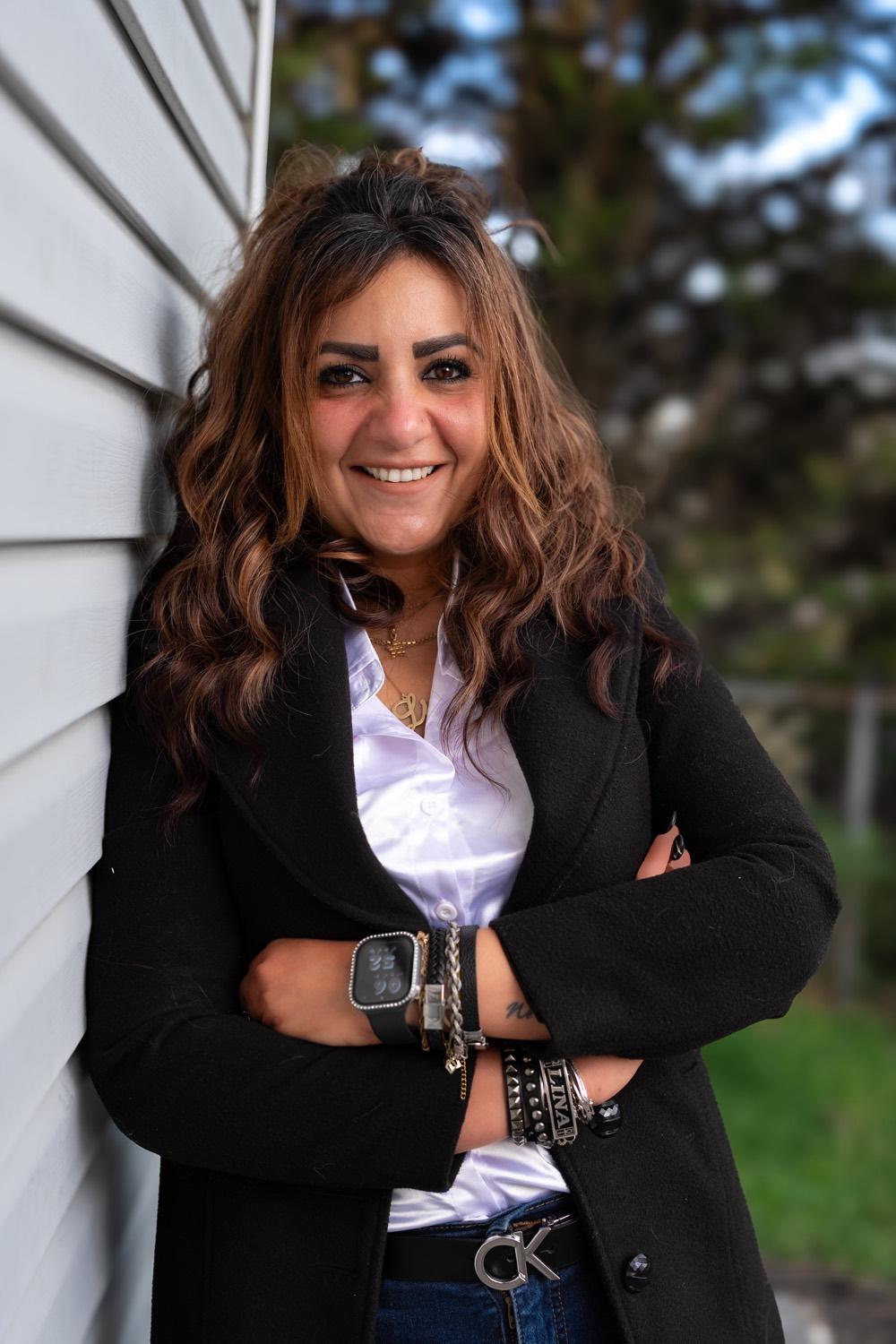 Professional corporate headshot of a woman