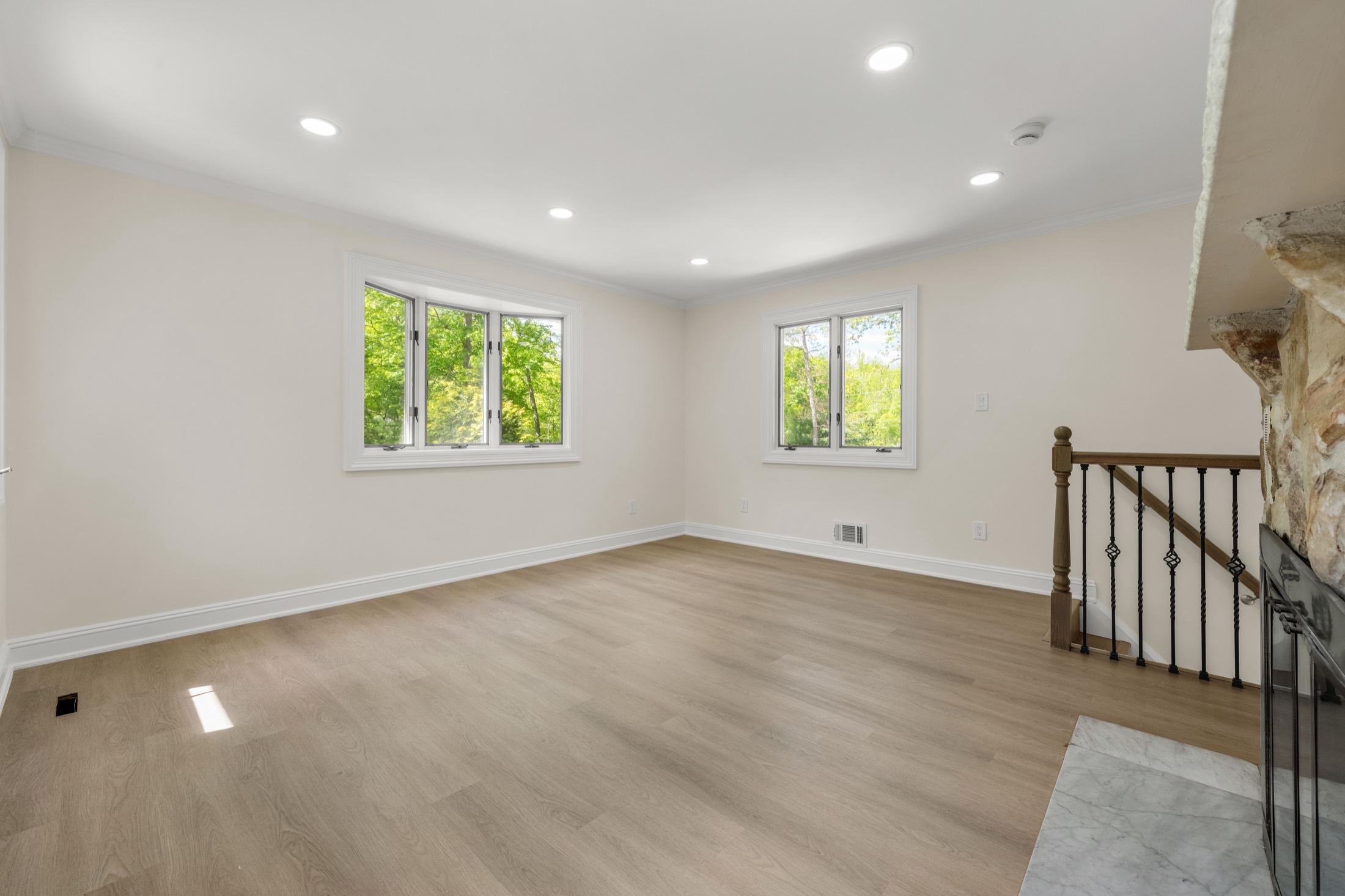 Empty family room, before virtual staging