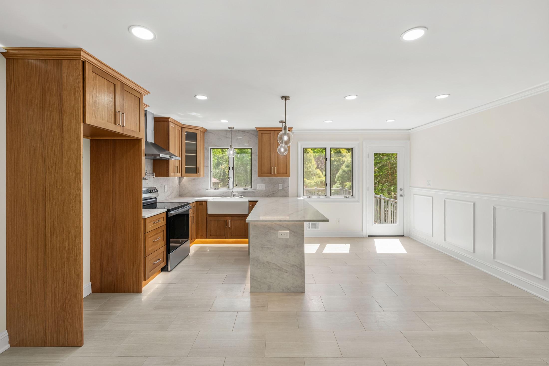 Empty kitchen and great room, before virtual staging, Cranbury NJ