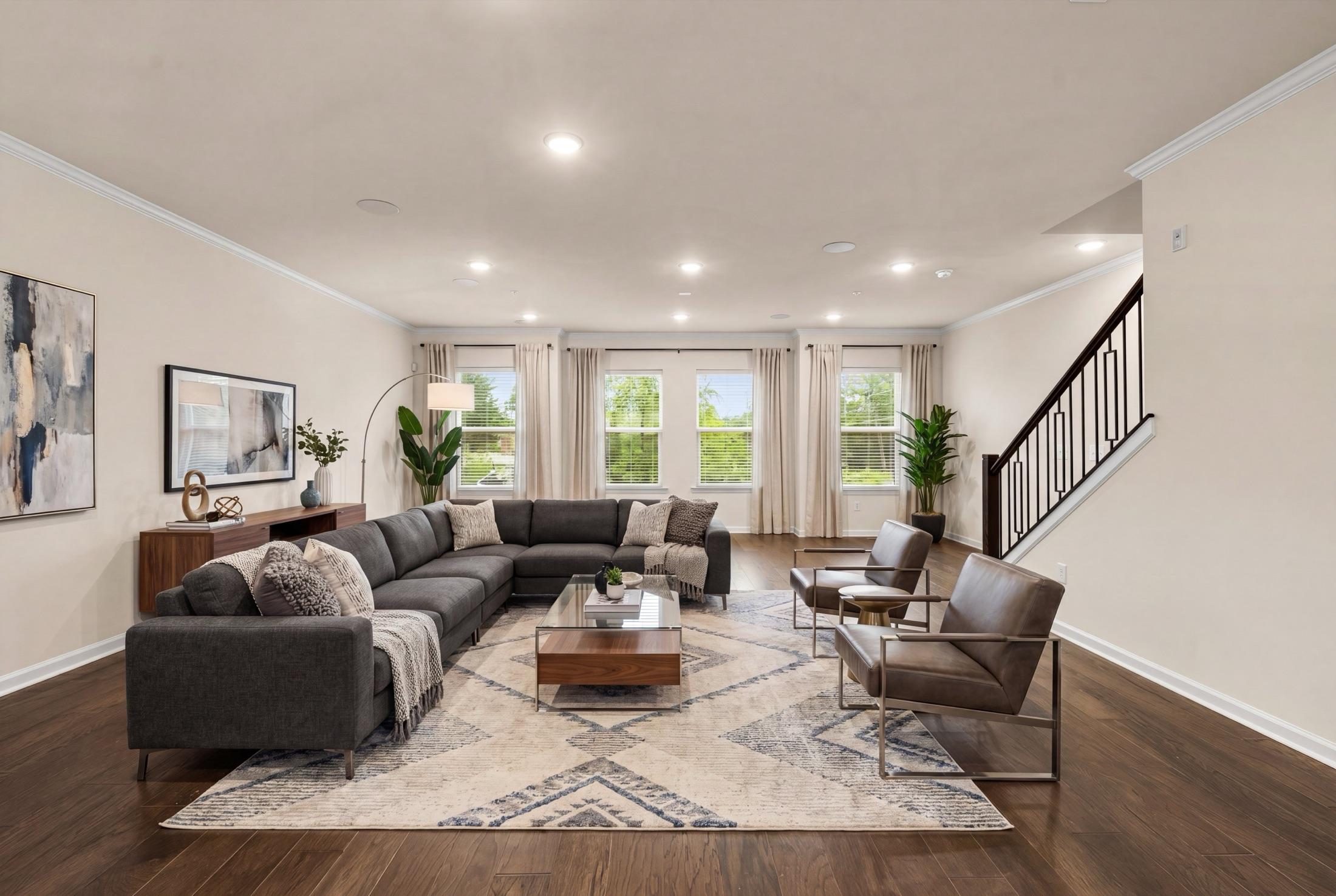 Virtually staged modern living room with sectional
